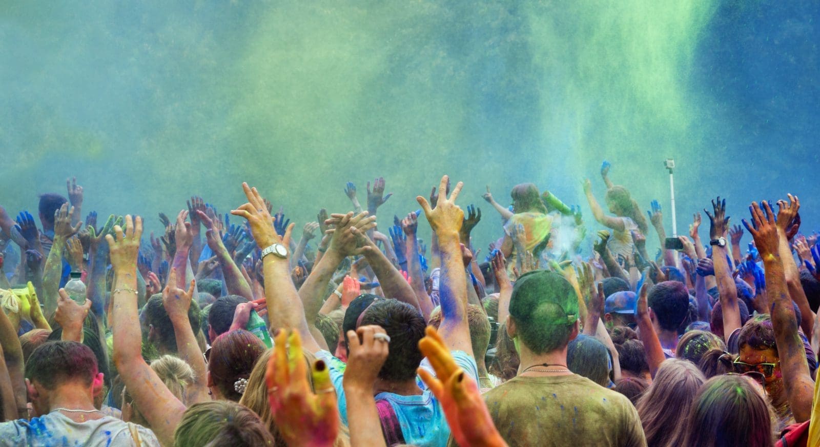 Celebrants dancing during the color Holi Festival