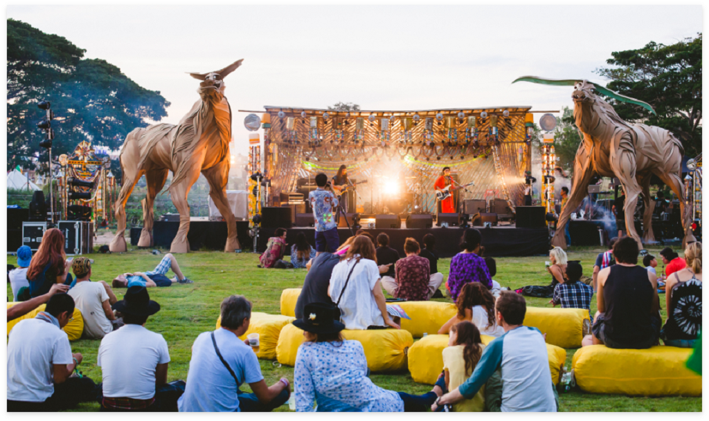 Stage built from trash and reclaimed wood