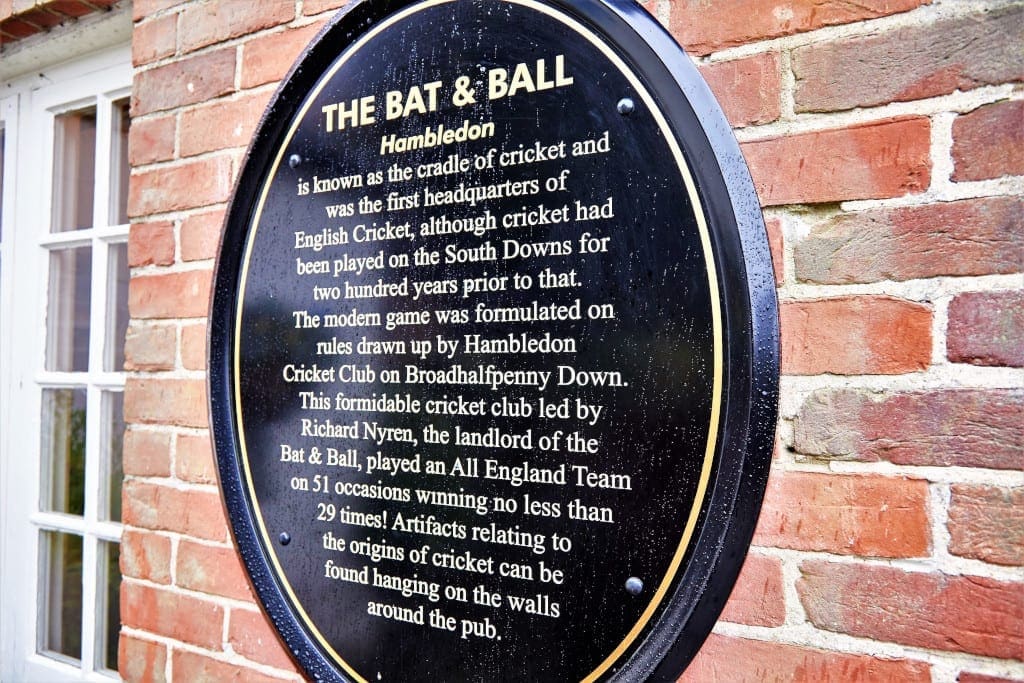 A plaque on the outside of the Bat and Ball