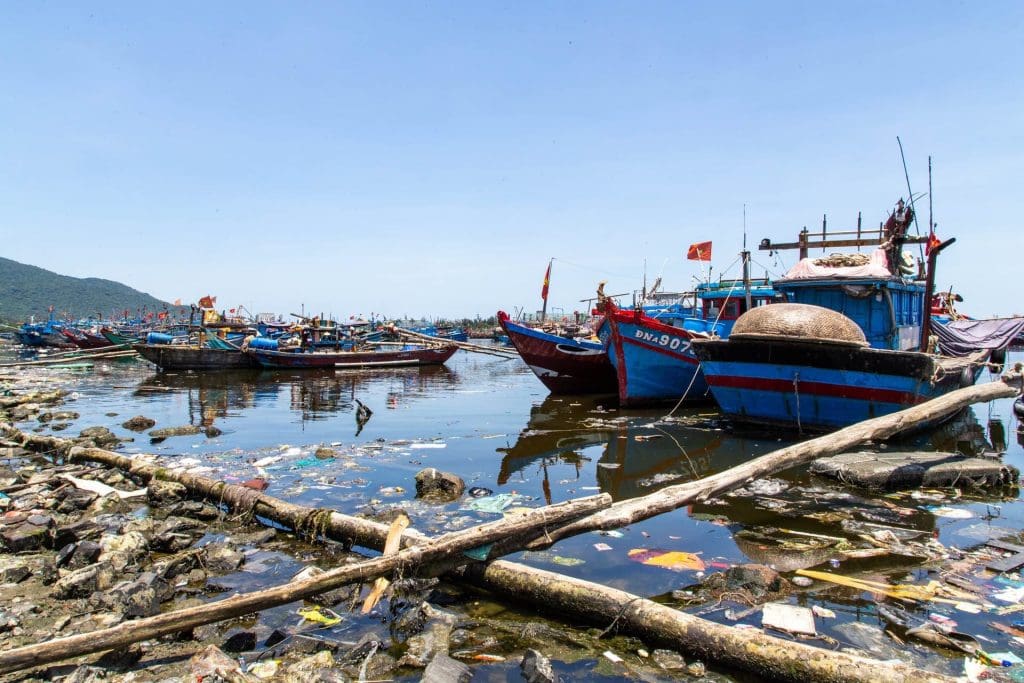Rubbish in the water at Da Nang's fishing port