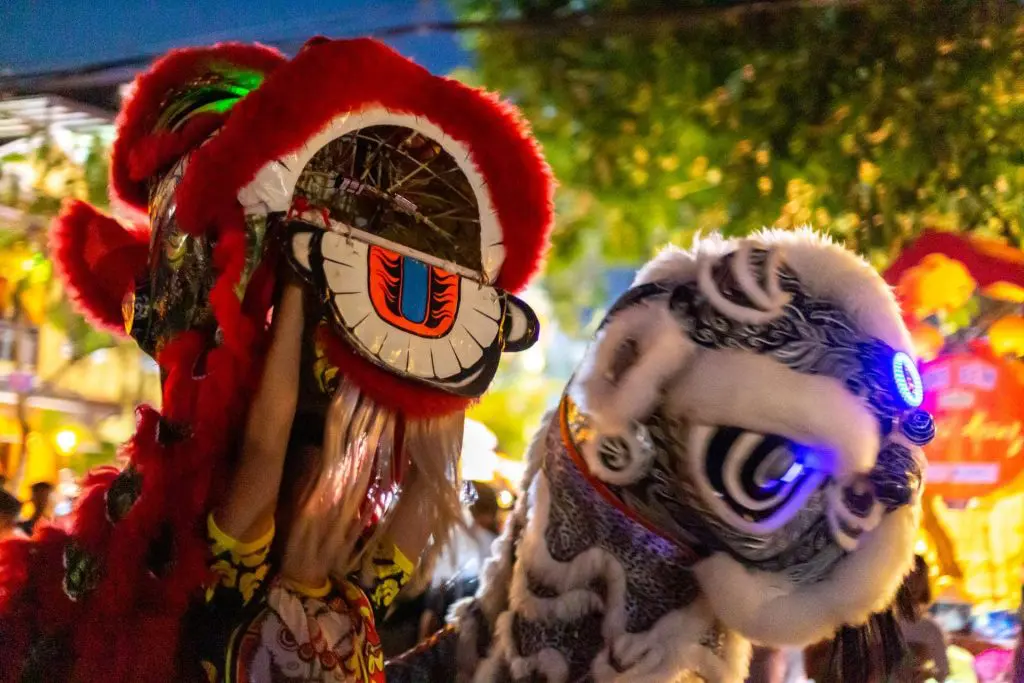 Lion dances through the streets of Hoi An ancient town on the full moon