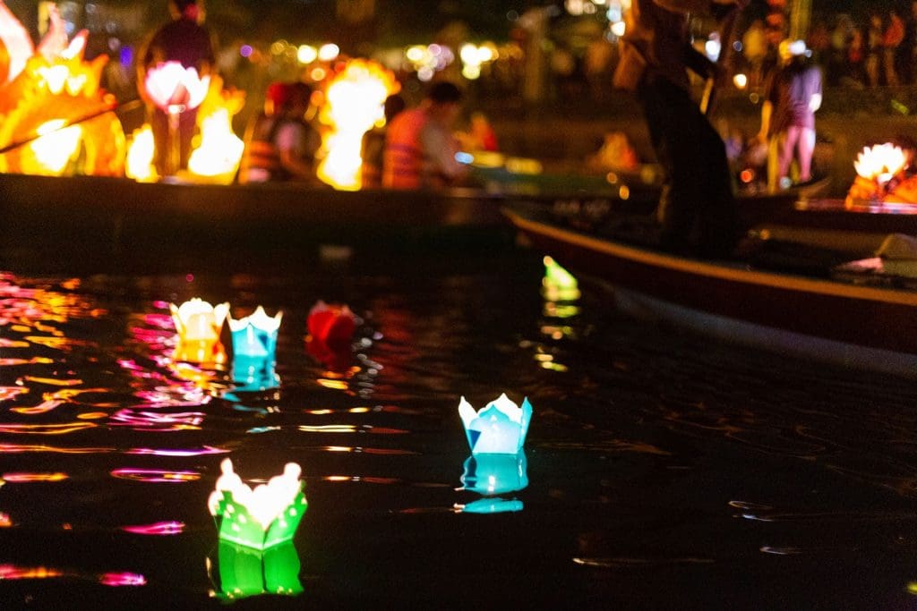 Paper lanterns float in the river at the Hoi An Lantern Festival