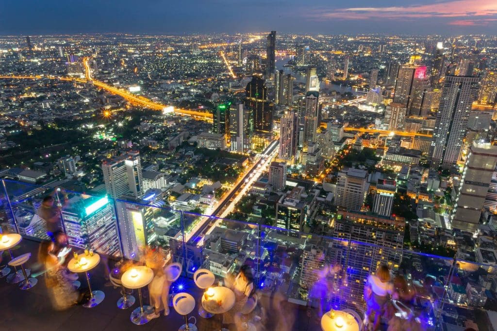 Night view over the Chao Phraya river from the bar at the MahaNakhon Tower