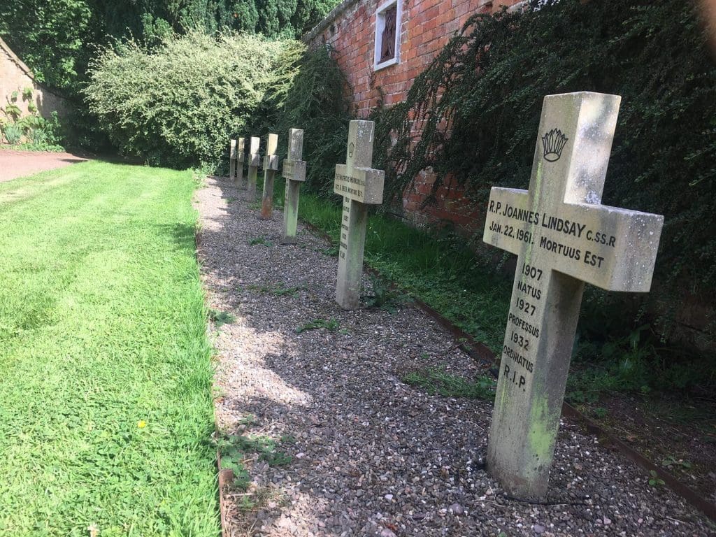 A small cemetery marks the graves of some of the priests buried here