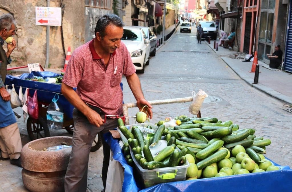 A cucumber vendor in Balat
