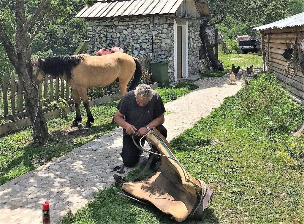 Preparing the saddle for the day's trek