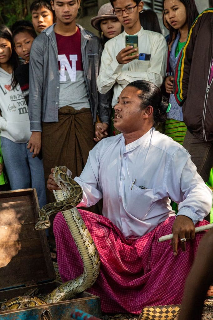 Snake charmer at U Bein Bridge