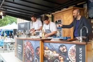 Zack Deakins from 1921 and Pascal Canevet from Maison Bleue on stage at the Our Bury St Edmunds Food & Drink Festival. (photo: Our Bury St Edmunds)