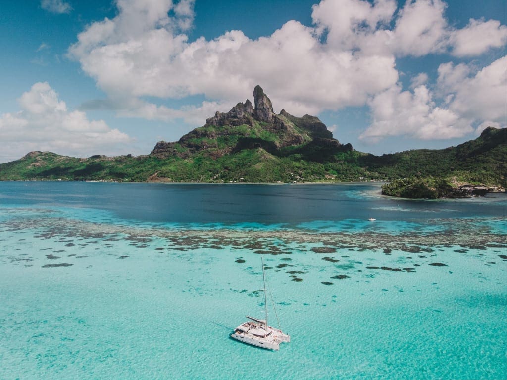 Wake up to beautiful blue waters in Tahiti