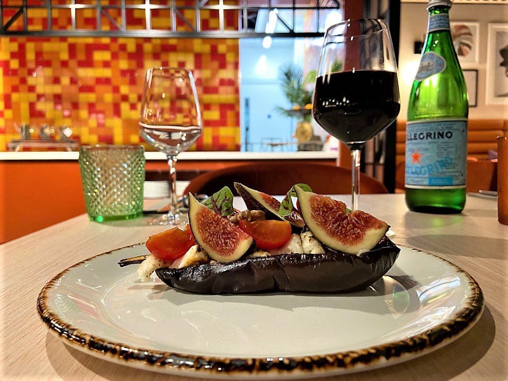 harissa roasted aubergine dish served with goat’s cheese