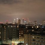 Camary Wharf appearing from the night sky