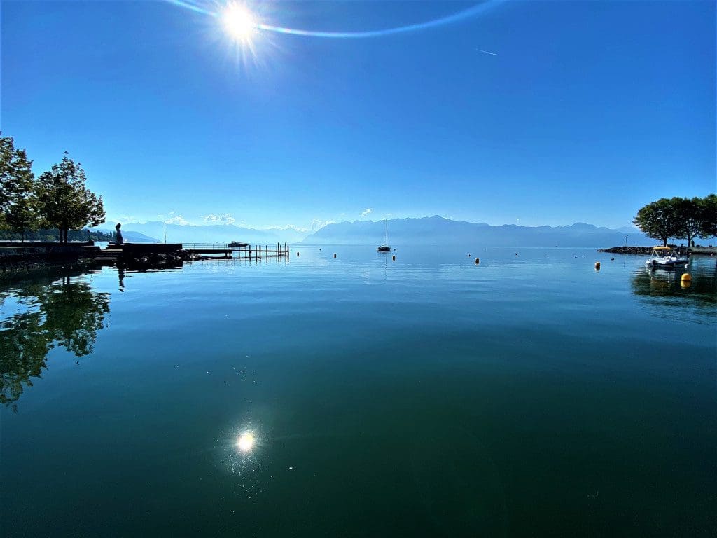 Lake Geneva glimmering in the sun taken from the pontoon