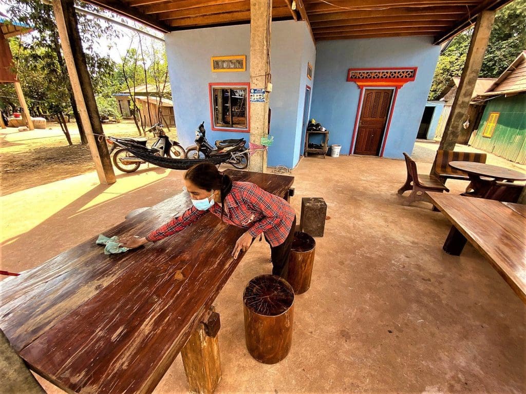 Svay Ran keeping her homestay spotless