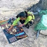 Copper Canyon Elena, 10, arranges her goods