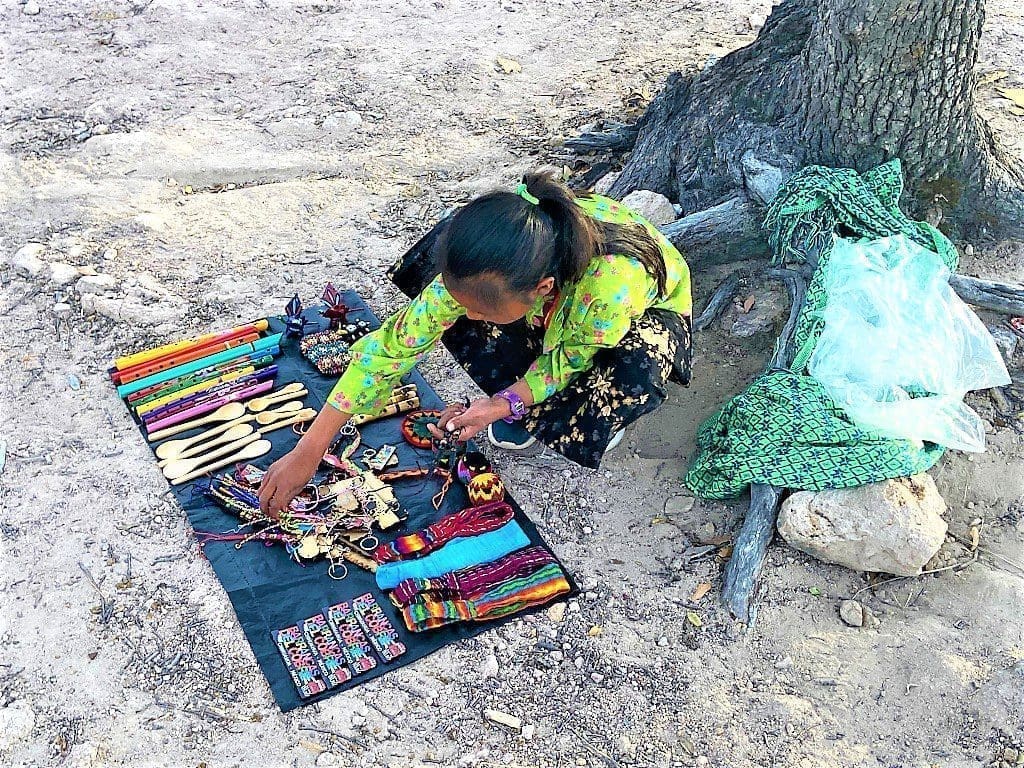 Copper Canyon Elena, 10, arranges her goods
