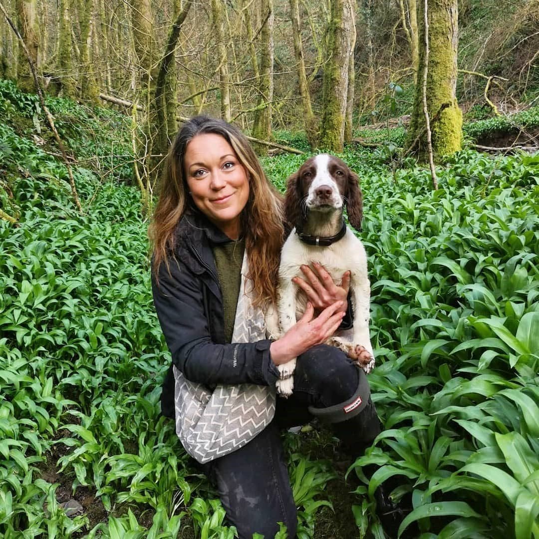 Gathering wild garlic … forager Chloé with one of her two dogs