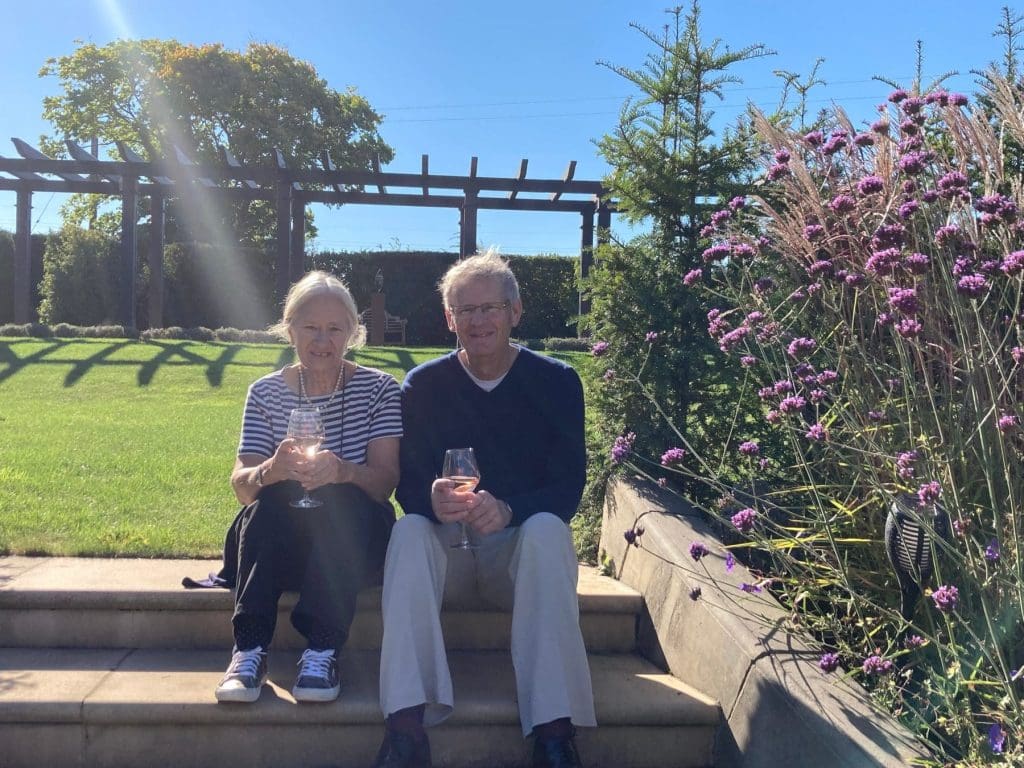 Roger and Eileen enjoying a tipple at Toppesfield Vineyard 