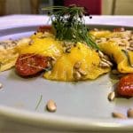 Vegan ricotta ravioli served with sage butter
