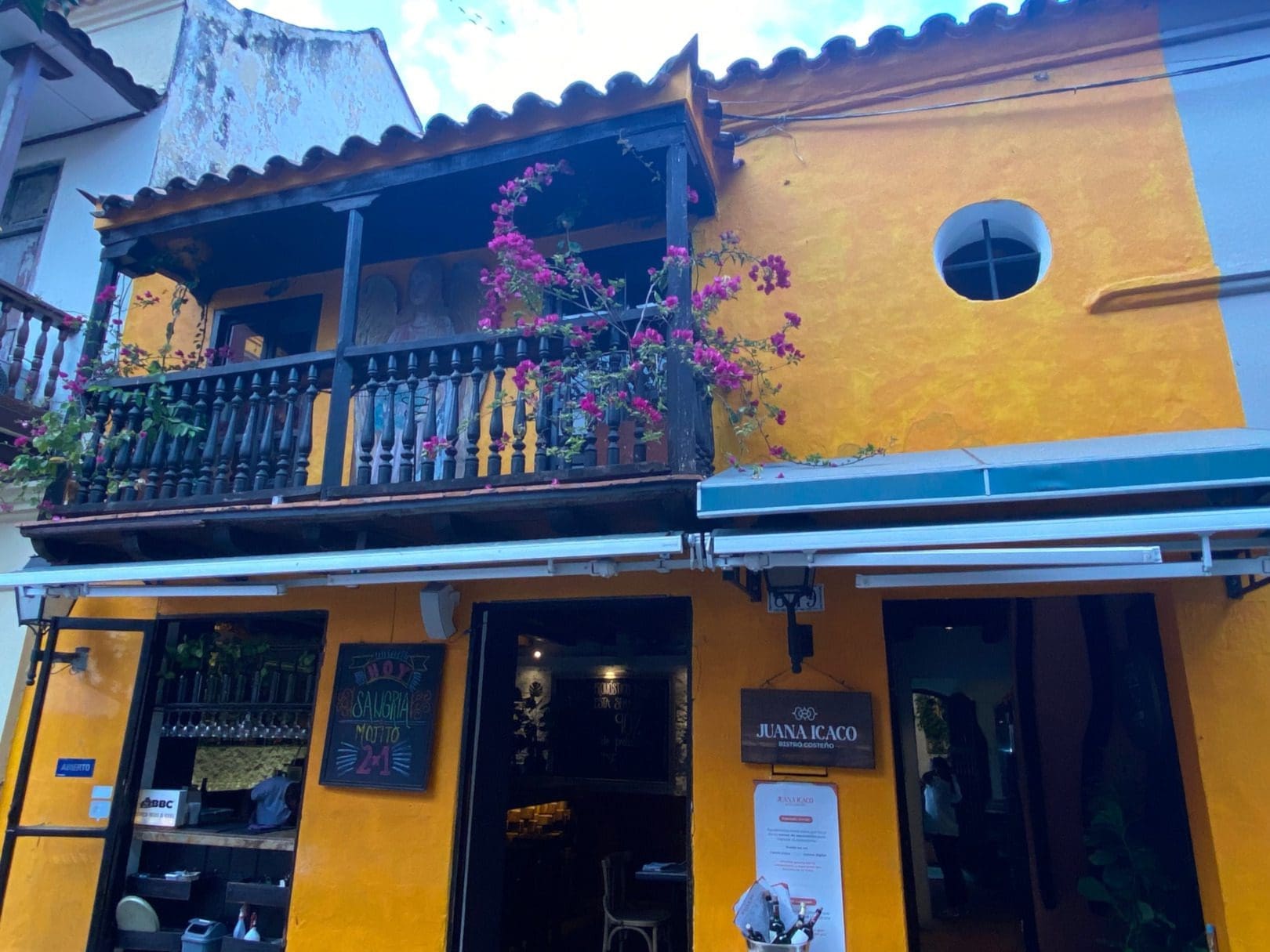One of the many colourful houses in the walled city of Cartagena Colombia