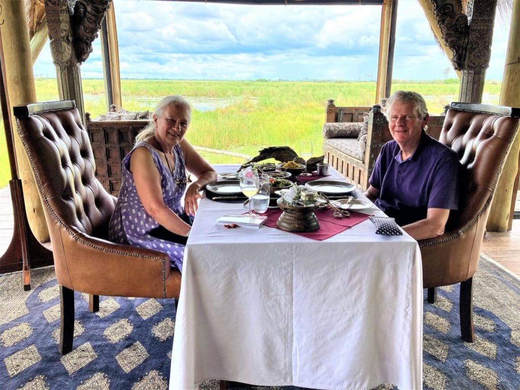 Roger and Eleen dining in luxury on their safari in Botswana