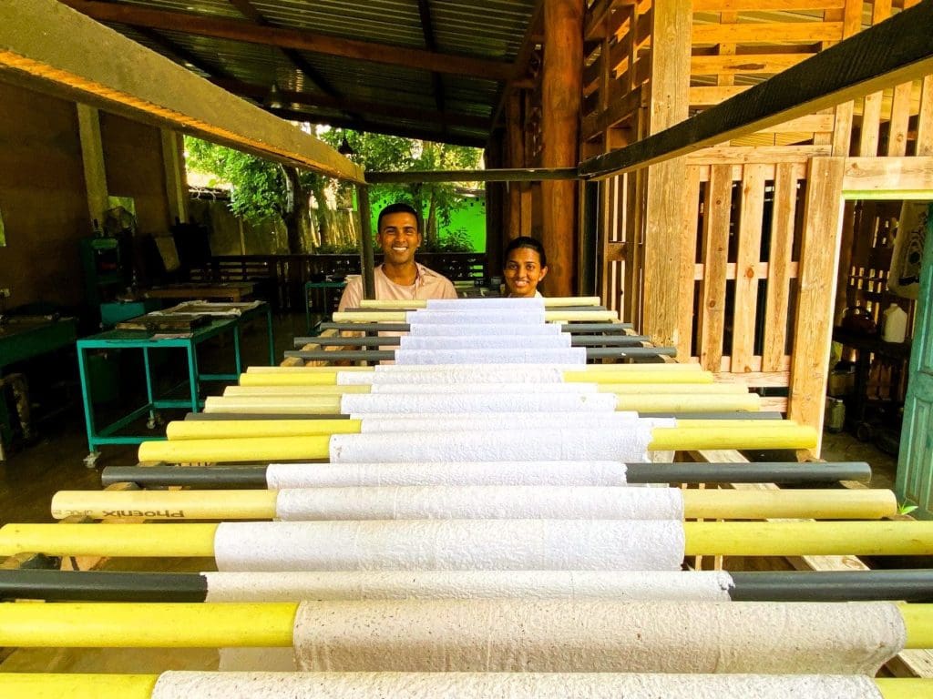 Yadira and Lathmi at the Aliya paper recycling plant.