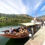 Our bikes being loaded onto a traditional Rabelo boat for a short river cruise.