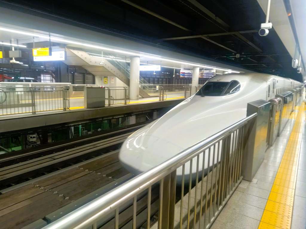 Bullet train pulling into the station