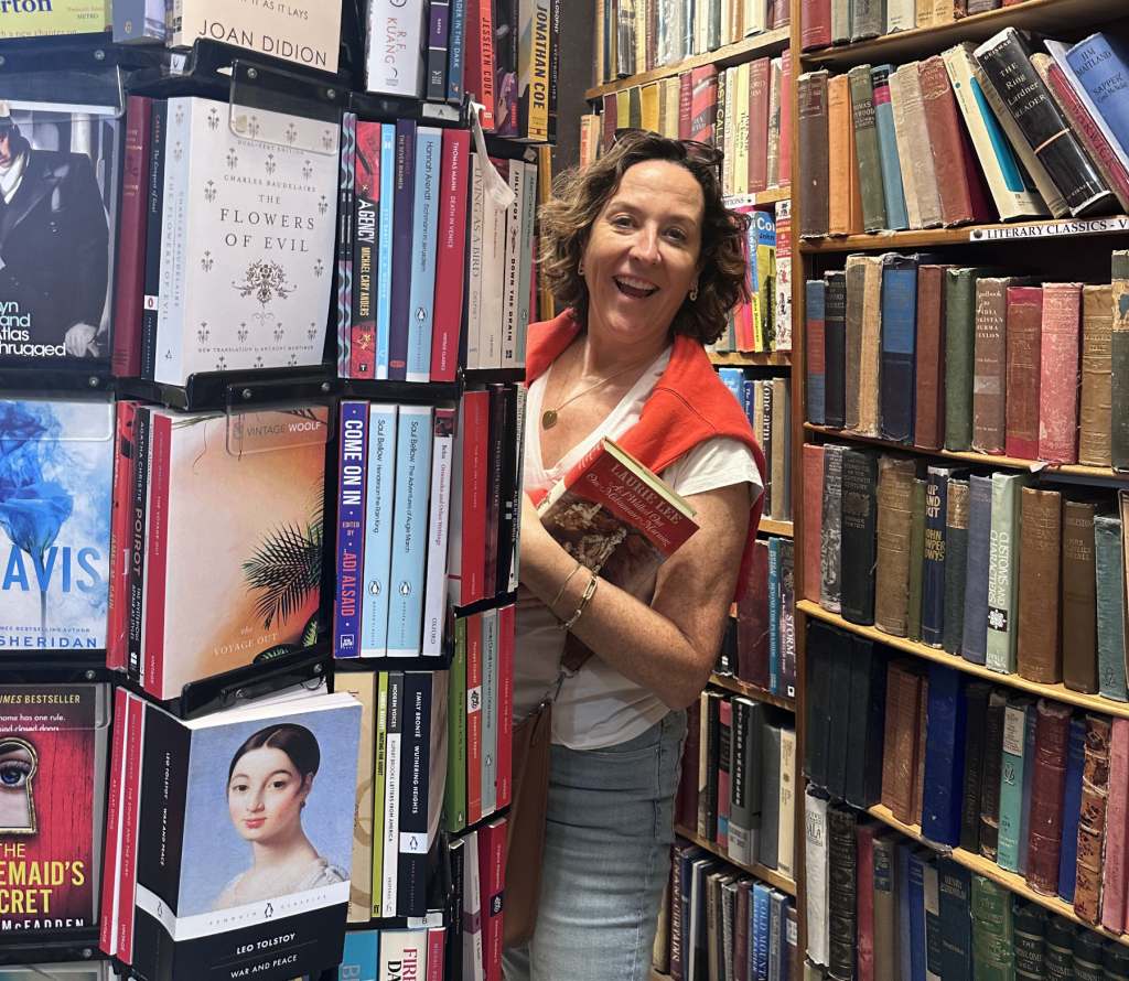 Leafing the books in Paris copyright Maria Boyle