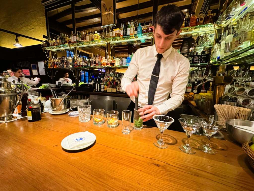 Mixing a cocktail at The Cock Madrid
