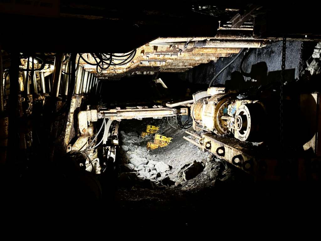 A robotic digger in the gallery