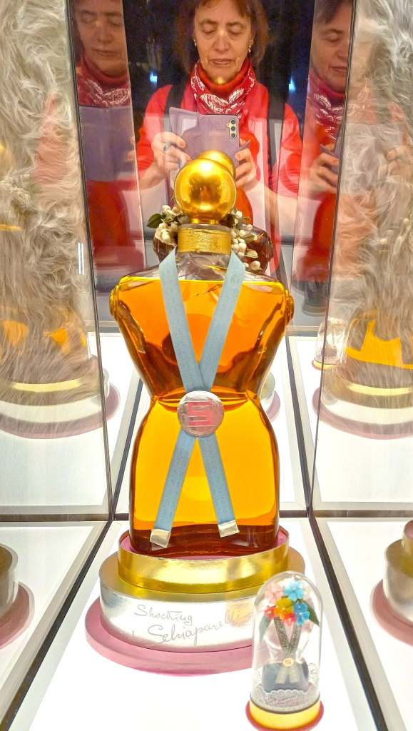 Shocking! by Schiaparelli, Elsa's iconic perfume, with bottle honouring the curvaceous figure of Mae West