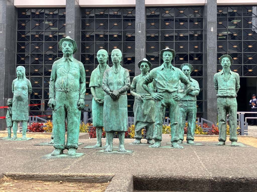 the 'Los Presentes' sculpture, embodying the Costa Rican peasant. San Jose