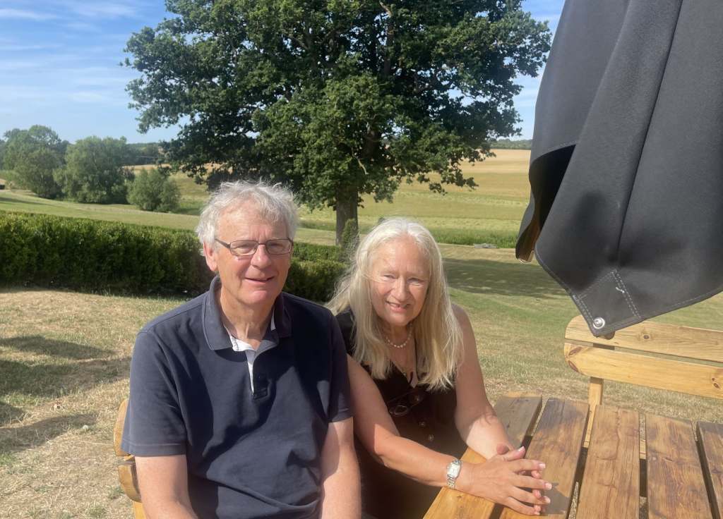 Roger and Eileen us in the garden overlooking the Brett Valley