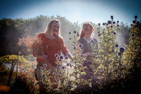 Jenny and Camille picking flowers in the Kitchen Garden at ANRÁN - CREDIT EDWIN HO
